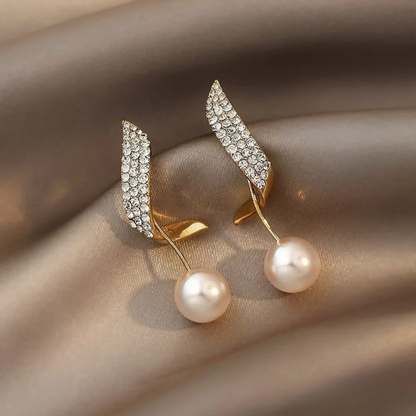 Elegant Gold Earrings Featuring Pearl Drops