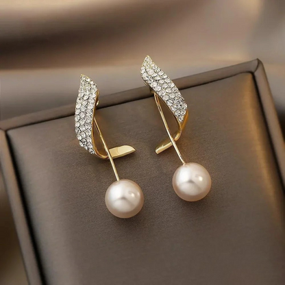 Elegant Gold Earrings Featuring Pearl Drops